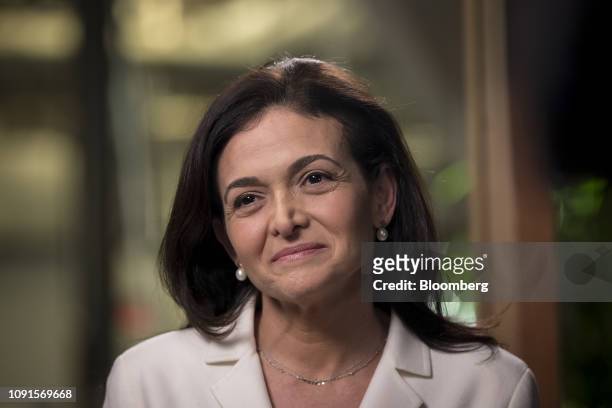 Sheryl Sandberg, chief operating officer of Facebook Inc., listens during a Bloomberg Television interview at the company's headquarters in Menlo...