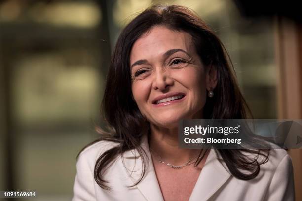 Sheryl Sandberg, chief operating officer of Facebook Inc., smiles during a Bloomberg Television interview at the company's headquarters in Menlo...