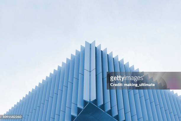 metal roof structure of office building ceiling - geometric building stock pictures, royalty-free photos & images
