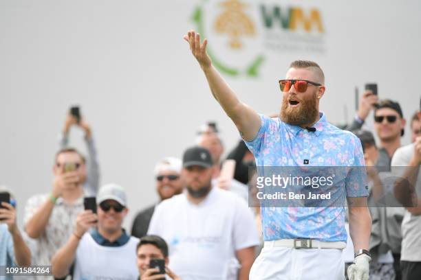 Arizona Diamondbacks pitcher Archie Bradley pumps up the crowd on the sixteenth hole tee box during the Annexes Pro-Am prior to the Waste Management...