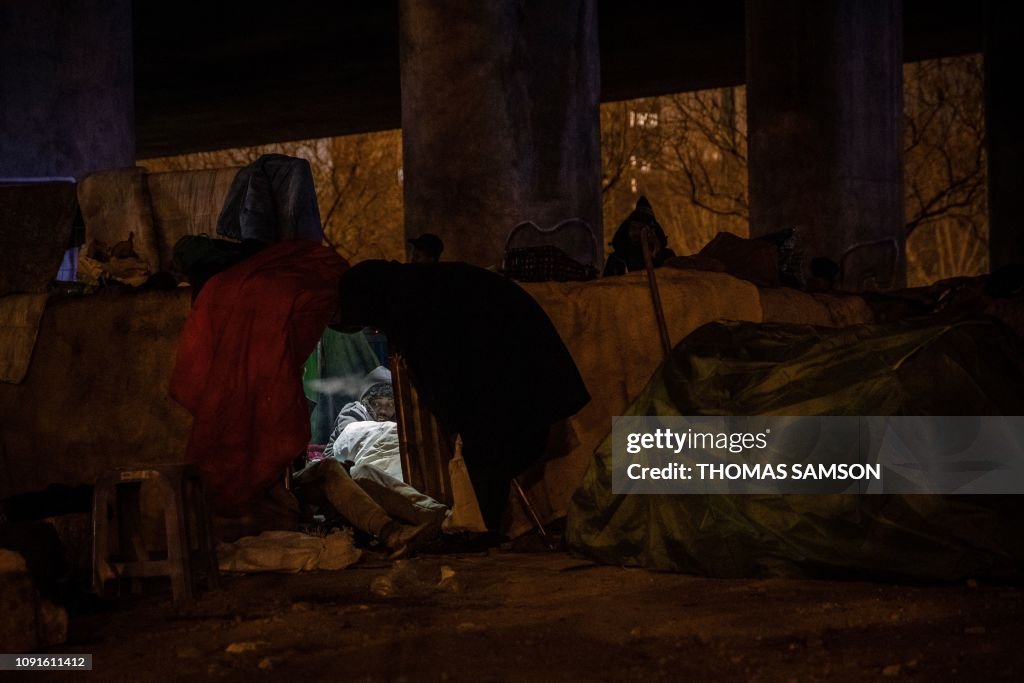 TOPSHOT-FRANCE-MIGRANTS-EVACUATION