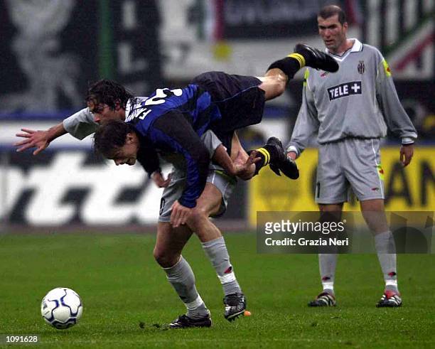 Farinos Francesco Favier of Inter Milan and Alessio Tacchinardi of Juventus in action during the Serie A 9th Round League match between Inter Milan...