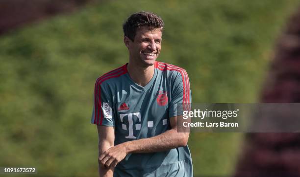 Thomas Mueller smiles during a training session at day six of the Bayern Muenchen training camp at Aspire Academy on January 07, 2019 in Doha, Qatar.