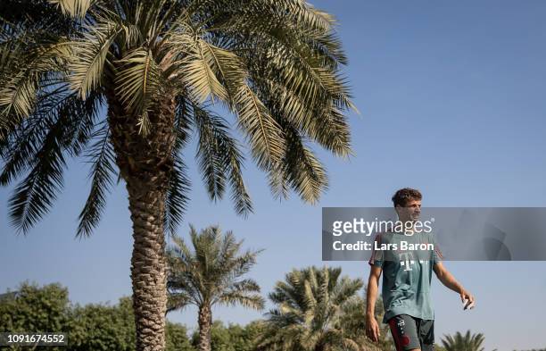 Thomas Mueller looks on during a training session at day six of the Bayern Muenchen training camp at Aspire Academy on January 07, 2019 in Doha,...