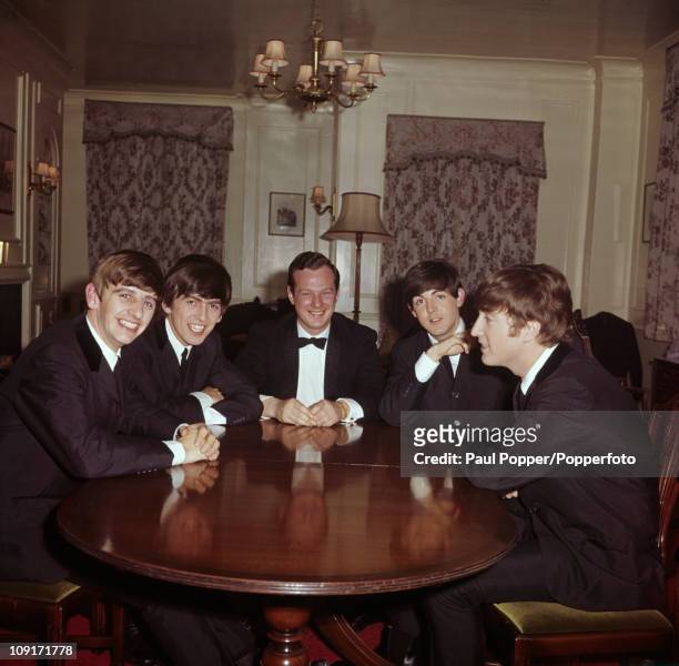 The Beatles with their manager Brian Epstein , 1963. From left to right, Ringo Starr, George Harrison, Epstein, Paul McCartney and John Lennon.