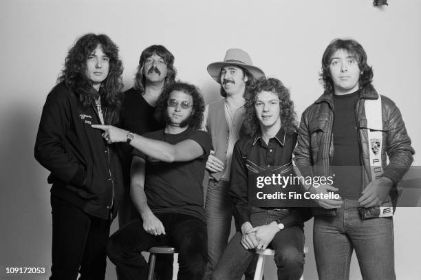 Whitesnake posed in London in February 1981. L-R David Coverdale, Jon Lord, Ian Paice, Micky Moody, Neil Murray, Bernie Marsden.