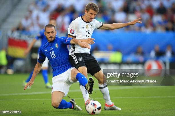 July 2016 - UEFA EURO 2016 - Quarter Final - Germany v Italy - Leonardo Bonucci of Italy in action with Thomas Mueller of Germany - .