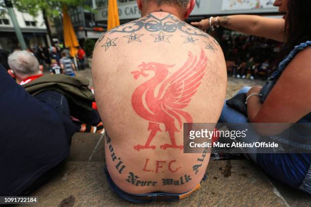 May 2016 - UEFA Europa League Final - Liverpool v Sevilla - A Liverpool fan shows off his tattoo of a Liverbird and the words 'You'll Never Walk...