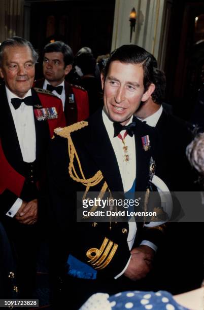 Prince Charles attends a variety show ' National Salute to the Falklands Task Force' at the London Coliseum theatre in London, on July 18, 1982.