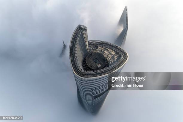 aerial view of shanghai lujiazui financial district in fog - lujiazui stockfoto's en -beelden