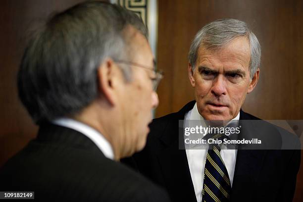 Energy Secretary Steven Chu talks with Senate Energy and Natural Resources Committee Chairman Sen. Jeff Bingaman before a committee hearing on...