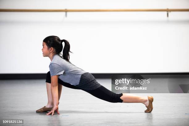 young girls practicing dance in studio - jazz dancing stock pictures, royalty-free photos & images