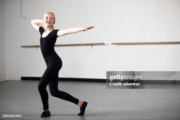 diverse young girls practicing musical theatre dance in studio - jazz dancing stock pictures, royalty-free photos & images