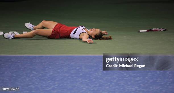 Anna Chakvetadze of Russia collapses during her Round 2 match against Caroline Wozniacki of Denmark during day three of the WTA Dubai Duty Free...