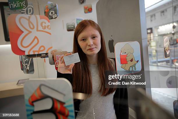 Emma Davis 17, from Orpington in Kent, poses for pictures at the Apple Store in the Bluewater Shopping Centre, after winning the App Store Countdown...