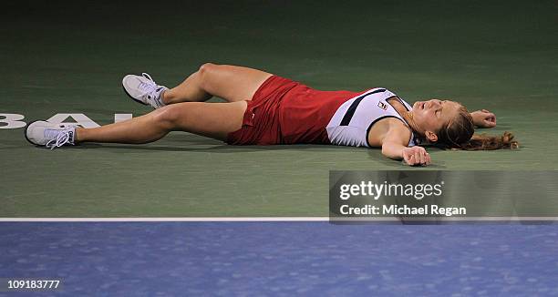 Anna Chakvetadze of Russia collapses during her Round 2 match against Caroline Wozniacki of Denmark during day three of the WTA Dubai Duty Free...