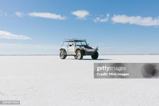 custom 4x4 vintage jeep parked on salt flats - salt flat stock pictures, royalty-free photos & images