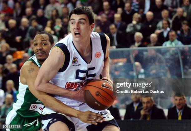 Emir Preldzic, #55 of Fenerbahce Ulker Istanbul competes with Marcus Brown, #5 of Zalgiris Kaunas in action during the 2010-2011 Turkish Airlines...