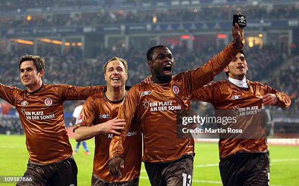 Gerald Asamoh of St.Pauli celebrates after scoring his team's opening goal during the Bundesliga match between Hamburger SV and FC St.Pauli at Imtech...