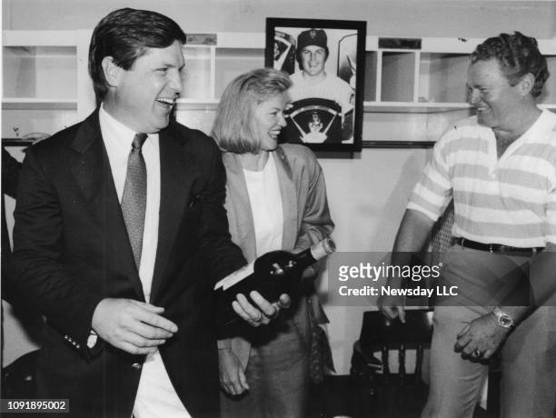 Tom Seaver and his wife Nancy share a joke with former Mets teammate Rusty Staub over a bottle of wine that he gave them at Shea Stadium in Flushing,...