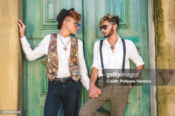 gay couple - hot young model stock pictures, royalty-free photos & images