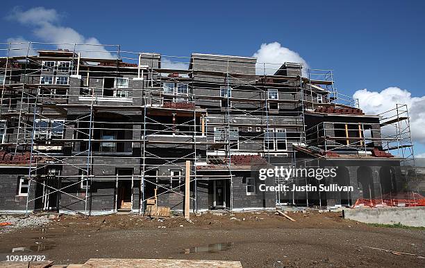 An under construction condo complex is seen in a housing development February 16, 2011 in Dublin, California. New home construction rose 14.6 percent...