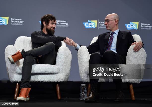 Twitter CEO Jack Dorsey and NBA Commissioner Adam Silver shake hands after speaking at a press event at CES 2019 at the Aria Resort & Casino on...