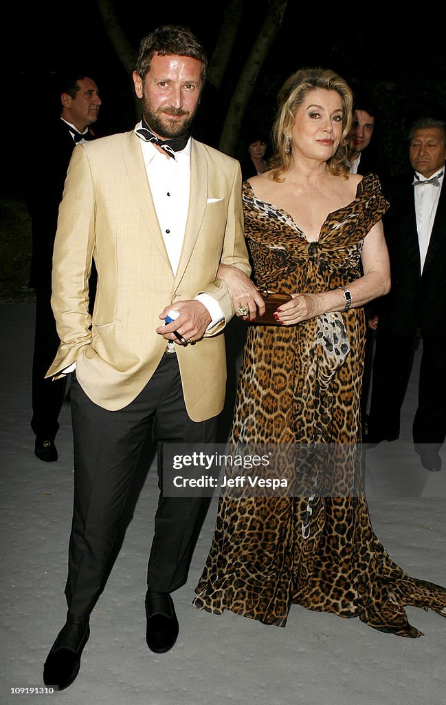 Stefano Pilati and Catherine Deneuve at amfAR's Cinema Against AIDS