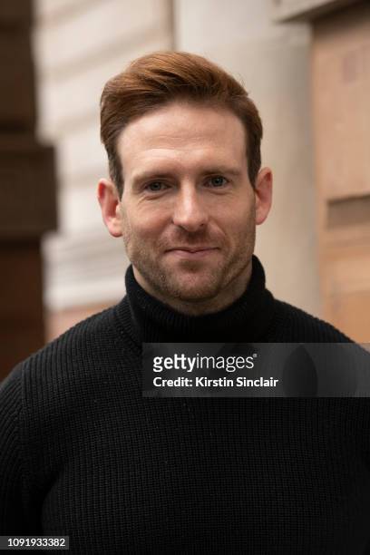 Actor Craig McGinlay wears a black jumper during London Fashion Week Men's January 2019 on January 07, 2019 in London, England.