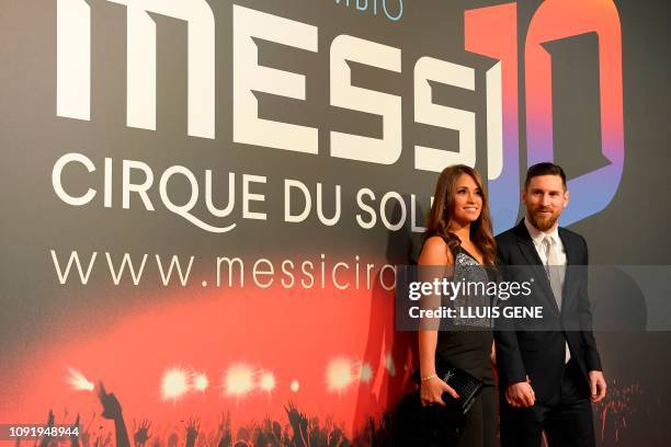 Barcelona's Argentinian forward Lionel Messi and his wife Antonella Roccuzzo pose on the red carpet during a photocall for Cirque du Soleil's latest...