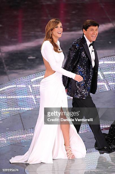 Elisabetta Canalis and Gianni Morandi attend the 61th Sanremo Song Festival at the Ariston Theatre on February 16, 2011 in San Remo, Italy.