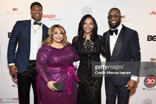 Jameis Winston, Melanie Few-Harrison, Breion Allen and Rickey Smiley attend the 2019 Super Bowl Gospel Celebration at Atlanta Symphony Hall on...