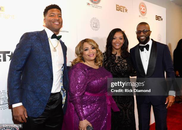 Jameis Winston, Melanie Few-Harrison, Breion Allen and Rickey Smiley attend the 2019 Super Bowl Gospel Celebration at Atlanta Symphony Hall on...