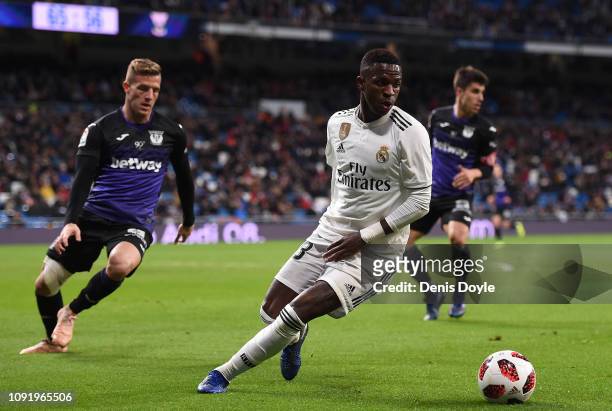 Vinicius Junior of Real Madrid CF in action against Jonathan Silva of CD Leganes during the Copa del Rey Round of 16 match between Real Madrid CF and...