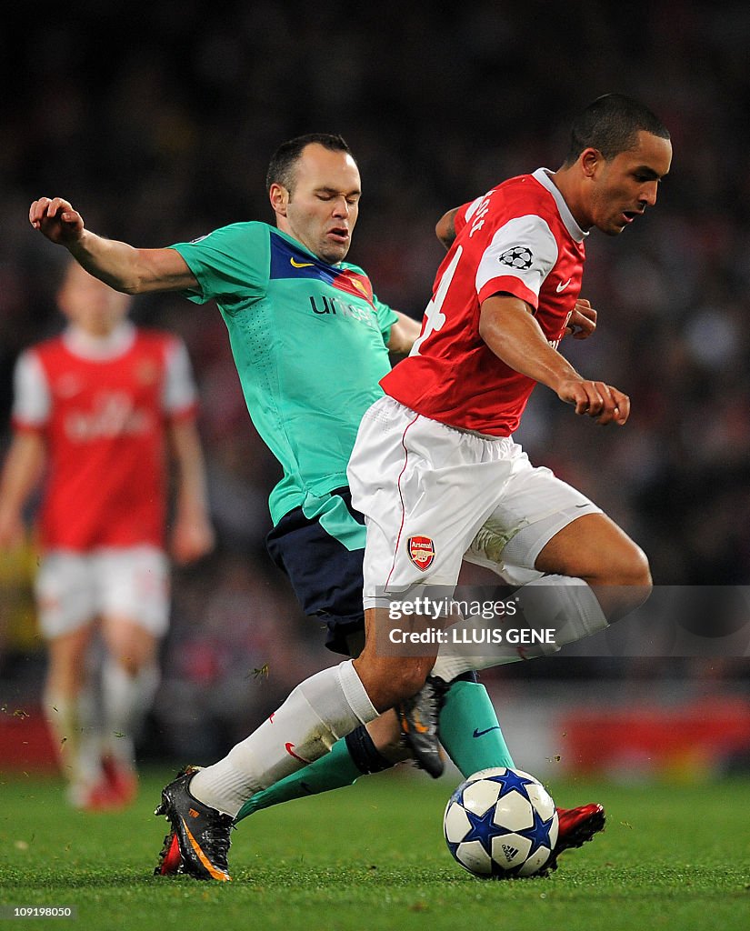 Arsenal O2 Walcott Arsenal's forward Theo Walcott vies with Barcelona's midfielder... News ...