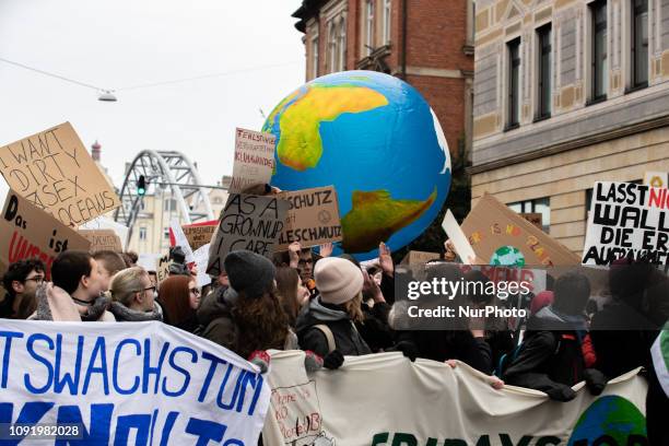 Activists with colorful signs and a huge plastic earth. 600 young students protested in the northern Bavarian town of Bamberg against Climate Change...