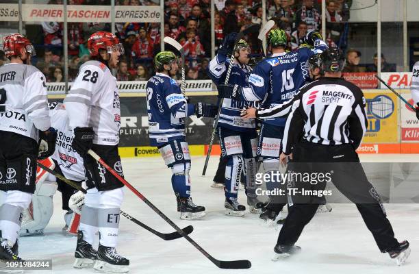 Justin Florek of Iserlohn Roosters celebrates after scoring his team's first goal with team mates during the DEL match between Iserlohn Roosters and...