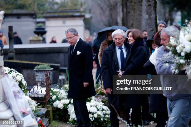 French actress Macha Meril in front of the grave of her late husband French music composer Michel Legrand during his burial at the Pere Lachaise...