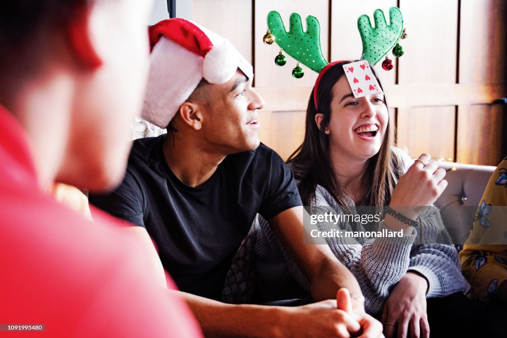 Generation z Christmas party with multi-ethnic friends