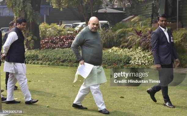 National President Amit Shah arrives to address media after Union Finance Minister Piyush Goyal presented Interim Budget-2019 in Parliament, at his...