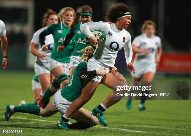 Shaunagh Brown of England is tackled by Alison Miller of Ireland during the Women's Six Nations match between Ireland and England at Energia Park,...