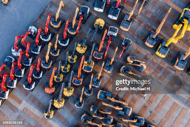 aerial photograph of outdoor warehouse of construction machine. - construction equipment bildbanksfoton och bilder