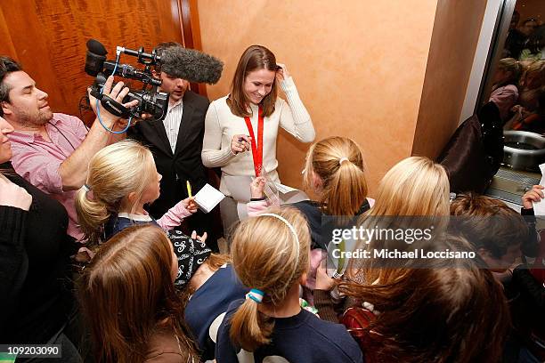 Professional soccer player Heather O'Reilly signs autographs during the HBO Documentary Screening of "Kick Like A Girl" at HBO Building on November...