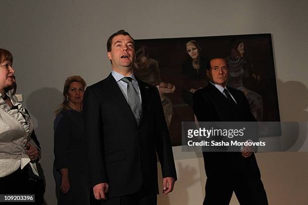 Russian President Dmitry Medvedev , Italian Prime Minister Silvio Berluskoni and Medvedev's wife Svetlana visit an art museum on February 16,2011 in...