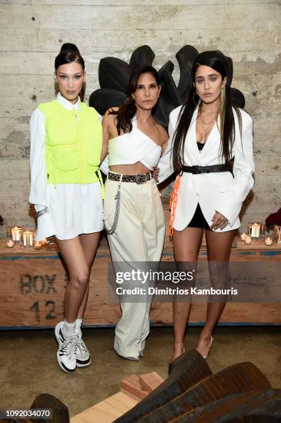 Bella Hadid, Laurie Lynn Stark, and Jesse Jo Stark attend the Louis Vuitton Dinner Mens SS19 Temporary Residency on January 09, 2019 in New York City.