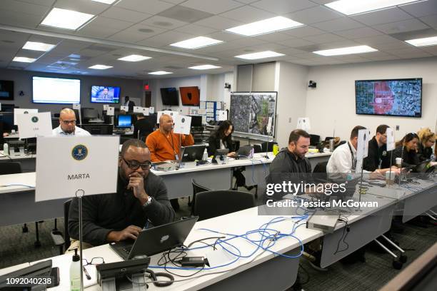 Federal, state and local law enforcement and other agencies work together in the Intelligence Operations Center and Critical Response Joint...