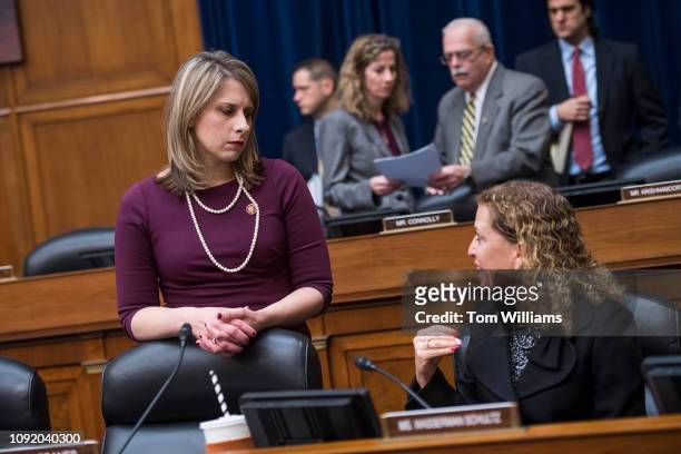 Reps. Katie Hill, D-Calif., left, and Debbie Wasserman Schultz, D-Fla., attend a House Oversight and Reform Committee business meeting in Rayburn...
