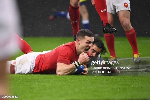 Wales' winger George North scores a try during the Six Nations rugby union tournament match between France and Wales at the stade de France, in Saint...