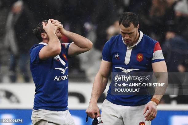 France's fly half Camille Lopez and France's flanker Wenceslas Lauret react at the end of the Six Nations rugby union tournament match between France...