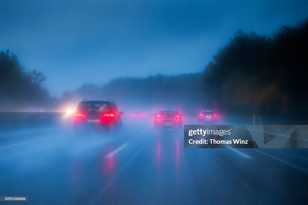 Driving in heavy rain on the freeway